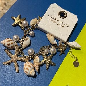 Altar’d State Gold Seashell and Starfish Charm Bracelet